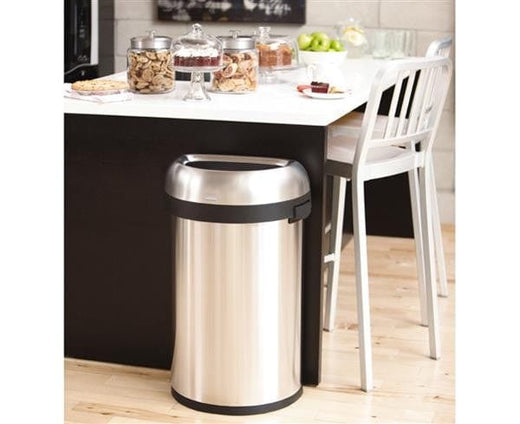 Semi circular open top litterbin against with flat back against kitchen counter