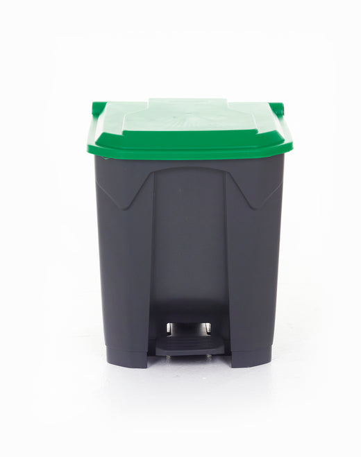 Green-topped pedal trash bin