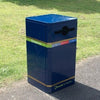 External Recycling Bin with Propeller Hole Front Aperture, set in a park.