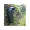 Post mountable litter bin against hedgerow.  Black body with domed li and gold tidyman logo to the front