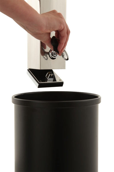 Cigarette bin with keyed lock showing in the unlocked position with liner underneath to collect the waste
