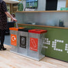 Triple recycling station in office location with mixed recycling, general waste and plastic bottles waste streams