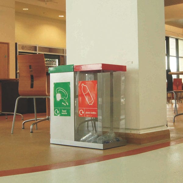 Dual recycling bin with mixed body option.  Food waste dark green lid with silver body, plastic bottle recycling bin with transparent body and red hole lid, graphics to complete the look