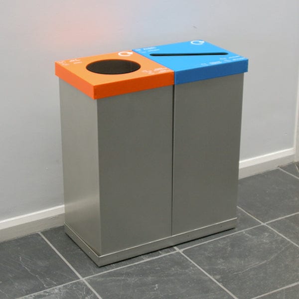 Double box internal recycling bin, silver bodies with red hole aperure and blue slot aperture.  