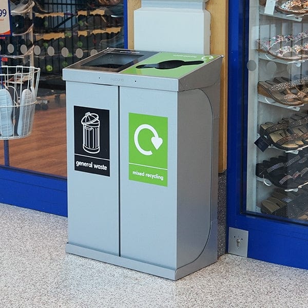 C-bin double recycling unit in a shopping centre. Bins feature Removable bodies for easy cleaning and emptying.