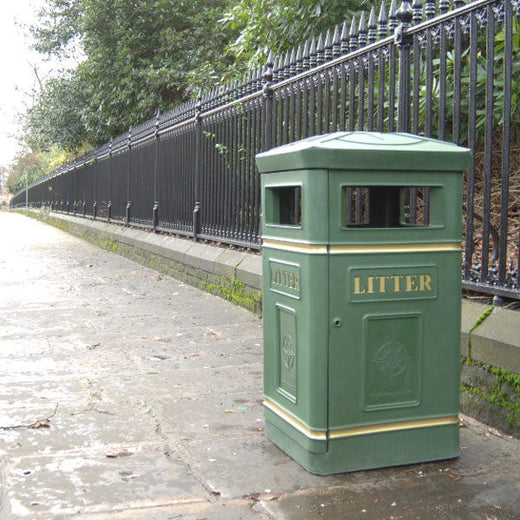 Green 112 litre litter bin with gold banding and litter artwork.   Open apertures to each side 