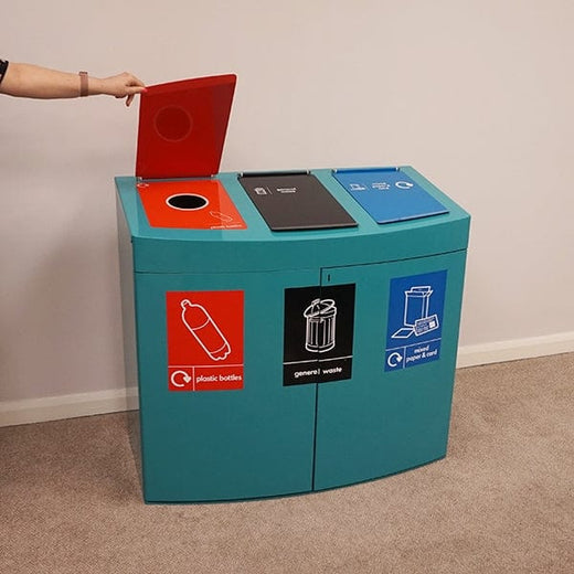 The red lid of the plastic waste section in the Console Recycling Bin being opened.