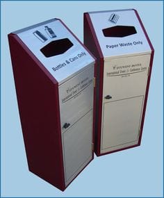 Internal metal recycling bins with sloped lid with ironography and aperture to the lid.  Burgundy body