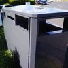 3 Compartment recycling bin in location showing aperture to 3 sides for disposal