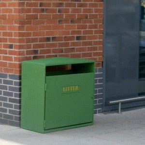 224L Never Rust Litter Bin neatly placed by the wall.