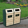 Timber front recycling bin in location with green surround.  Light oak slates, standard apertures and custom perspex plates