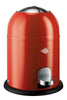 Compact litter bin finished in red with lid closed and protective rim