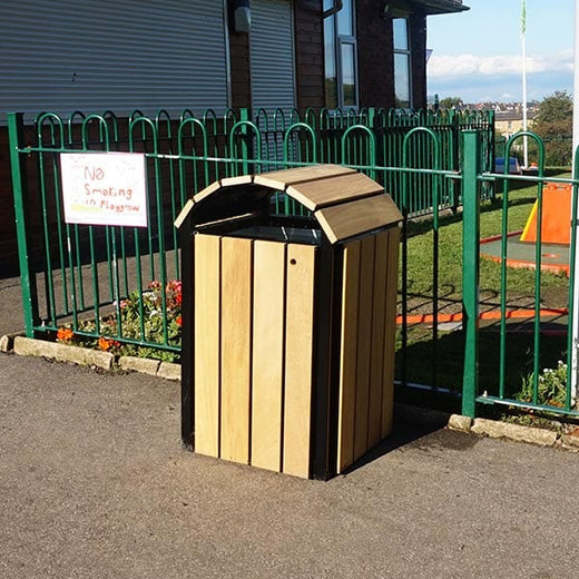Freestanding litter bin with wood slats surrounding, bin featuring dome slatted lid