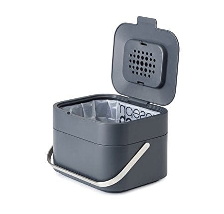 a graphite colored food trash bin with lid open. The odor filter is visible from the lid.