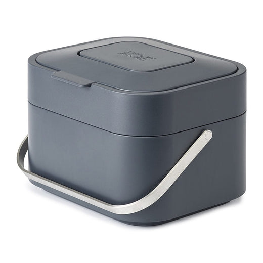 a food waste bin in graphite color. It has an odor filter attached to the closed lid.