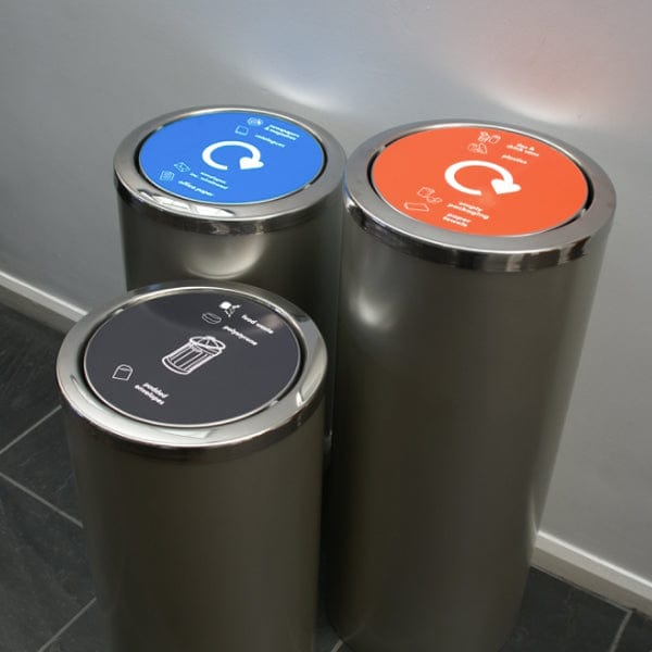Freestanding torpedos showing different sizes with waste streams labels on the lid