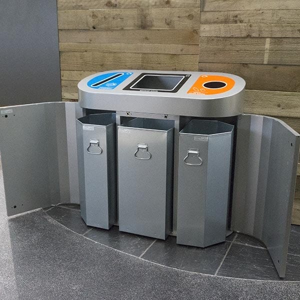 Internal recycling station with front access doors opening showing internal liners
