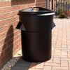 Round blak dustbin with 94 litre capcacity, flexible plastic with moulded handles.  Removable lid with top handle