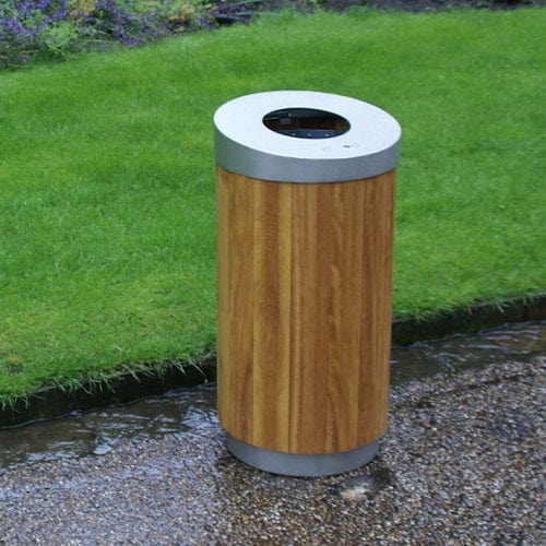 Circular wooden litter bin with treated wood in location